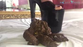 Ginger-haired chick defecates beside the looking glass