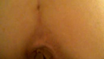 Homemade video of an amateur woman defecating from her buttocks while filming