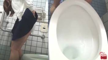 Asian female defecating in a public restroom 5