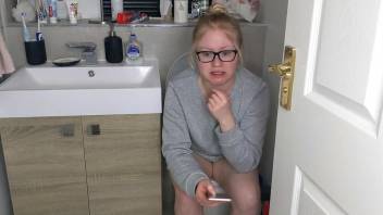 Sofia the scat girl chatting on the commode while defecating