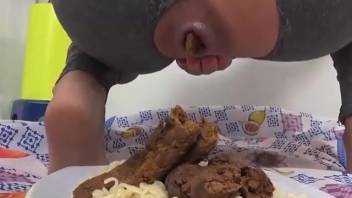 Cutie defecates into noodles via a rip in her trousers