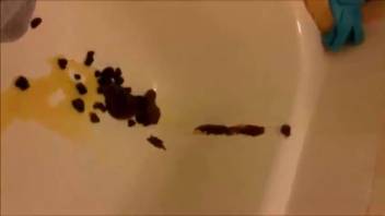 Young woman defecates in the tub through the window