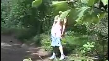 Busty Dasha urinating in the shrubbery