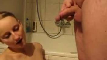 Man urinating in Lolita's mouth