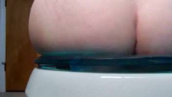 Girl pooping on the potty